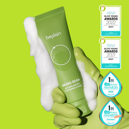 beplain Mung Bean pH-Balanced Cleansing Foam covered with white foam, with 2021 and 2022 Olive Young & 2019 and 2020 Hwahae award badges