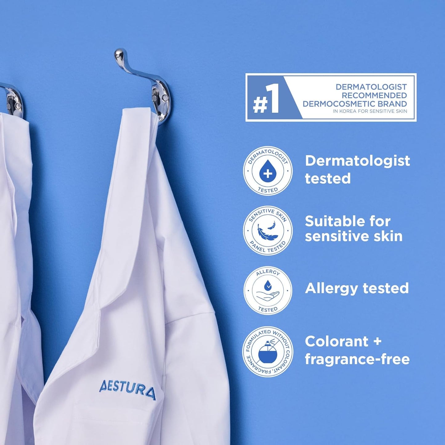AESTURA White lab coat hanging on a hook with dermatologist-tested product suitable for sensitive skin 