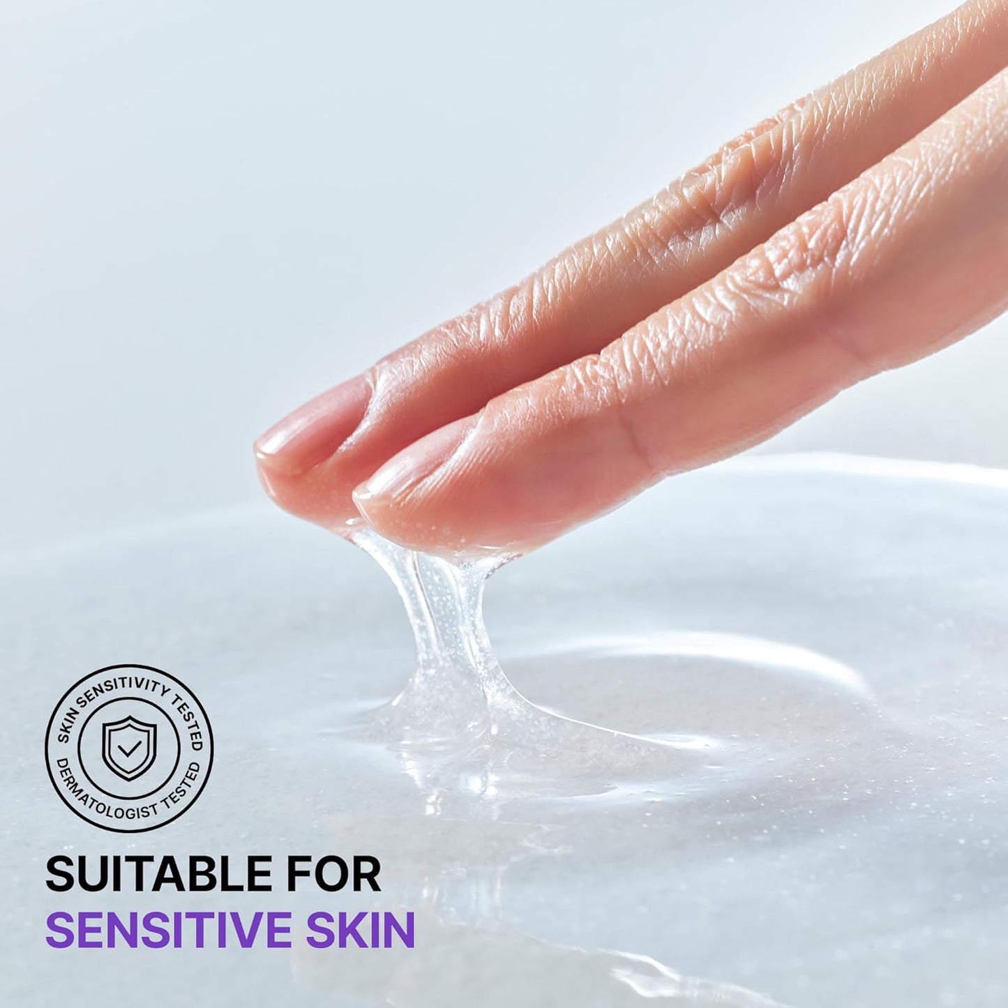 Hand lifting up BIOHEAL BOH Probioderm 3D Lifting Essential Toner to show the texture of the product and text highlighting 'Suitable for Sensitive Skin'