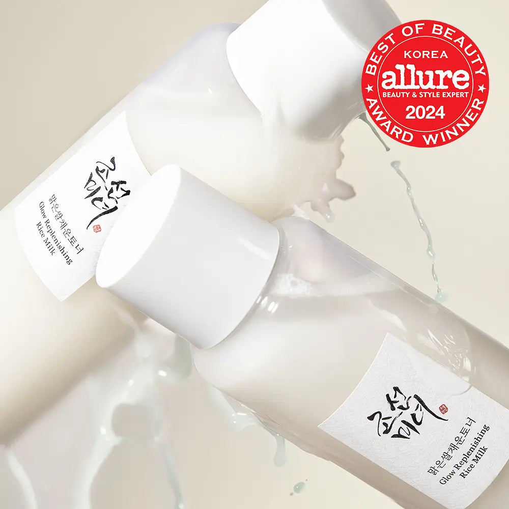 Two Beauty of Joseon Glow Replenishing Rice Milk bottles with a 'Best of Beauty' Allure Korea 2024 award badge on a light background.