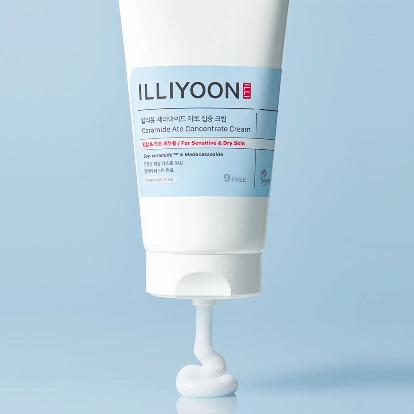 Tube of Illiyoon Ceramide Ato Concentrate Cream on a light blue background