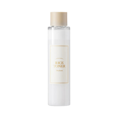 Bottle of I'm from Rice Toner with a beige cap on a white background