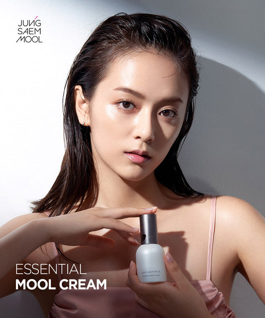 Woman with perfect makeup holding a bottle of 'EJUNGSAEMMOOL Essential Mool Cream'