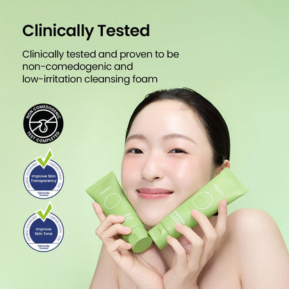 Woman holding 2 beplain Mung Bean pH-Balanced Cleansing Foam bottles with text about clinical testing and proven to be non-comedogenic, low irritation cleansing, improves skin transarency, improves skin tone. 